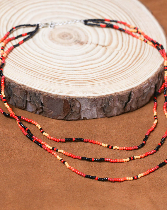 Sunset Harmony Beaded Necklace and Bracelets Set – Red, Orange, Yellow, and Black Design