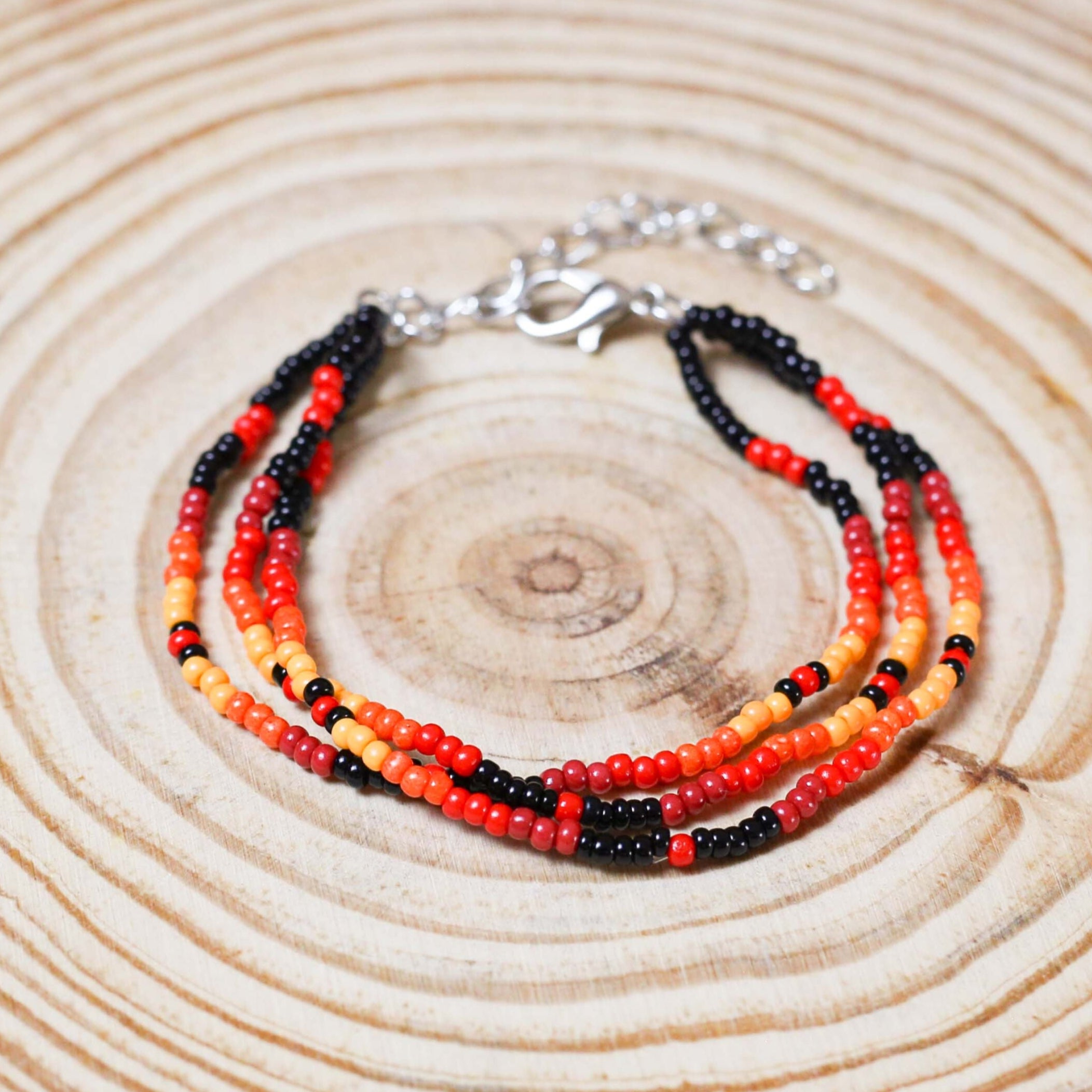 Sunset Harmony Beaded Bracelet – Bold Red, Orange, Yellow, and Black Strands