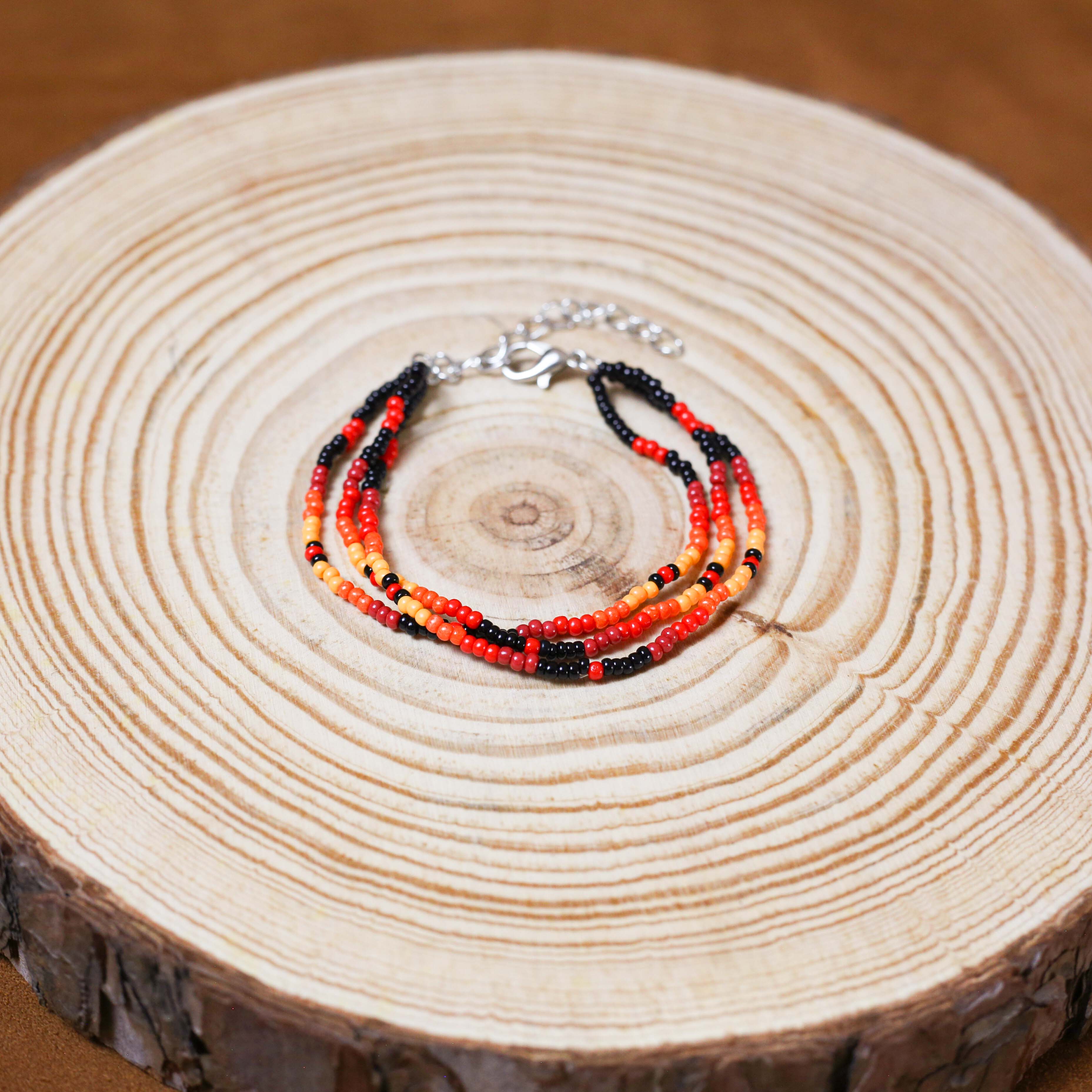 Sunset Harmony Beaded Necklace and Bracelets Set – Red, Orange, Yellow, and Black Design