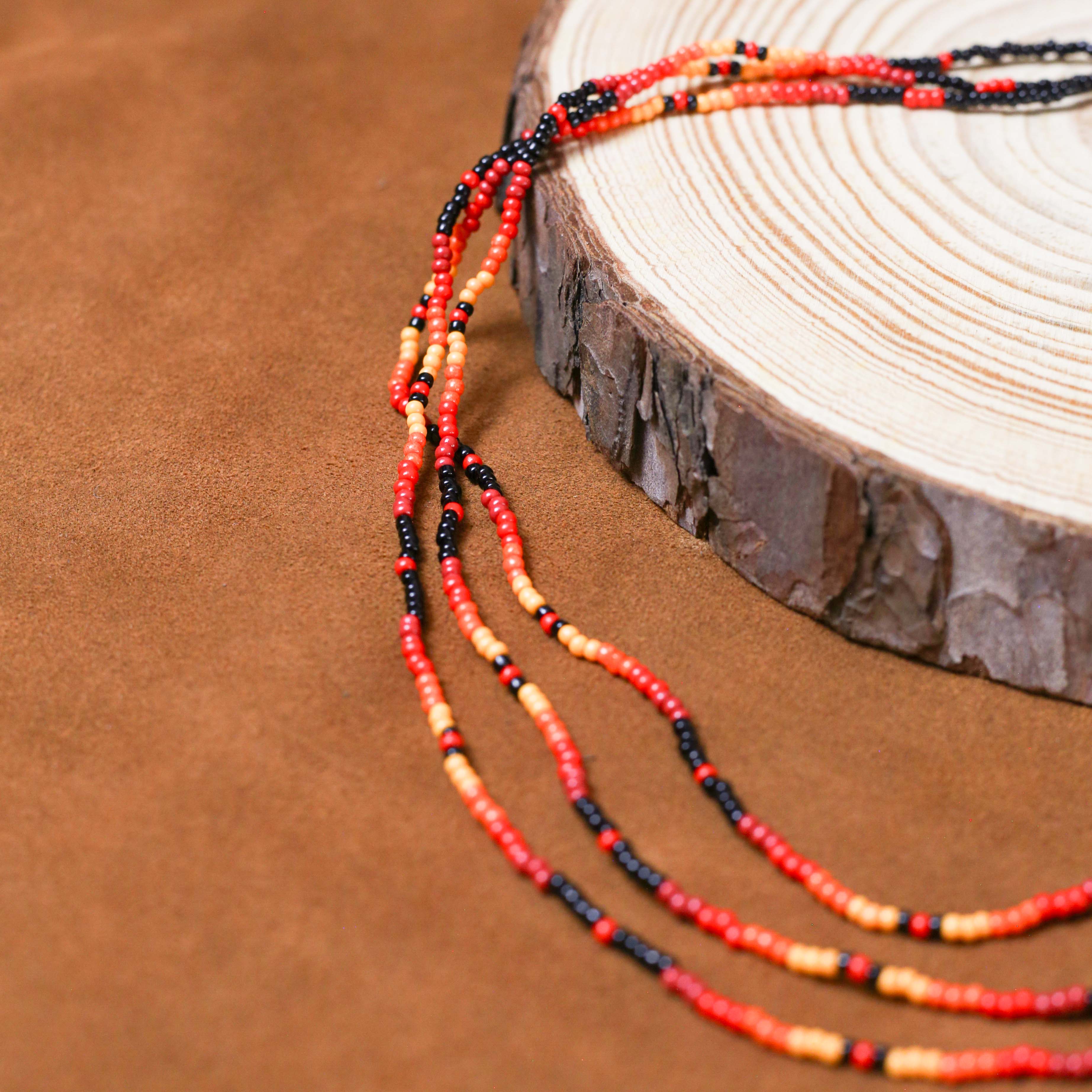 Sunset Harmony Beaded Necklace – Red, Orange, Yellow, and Black Design