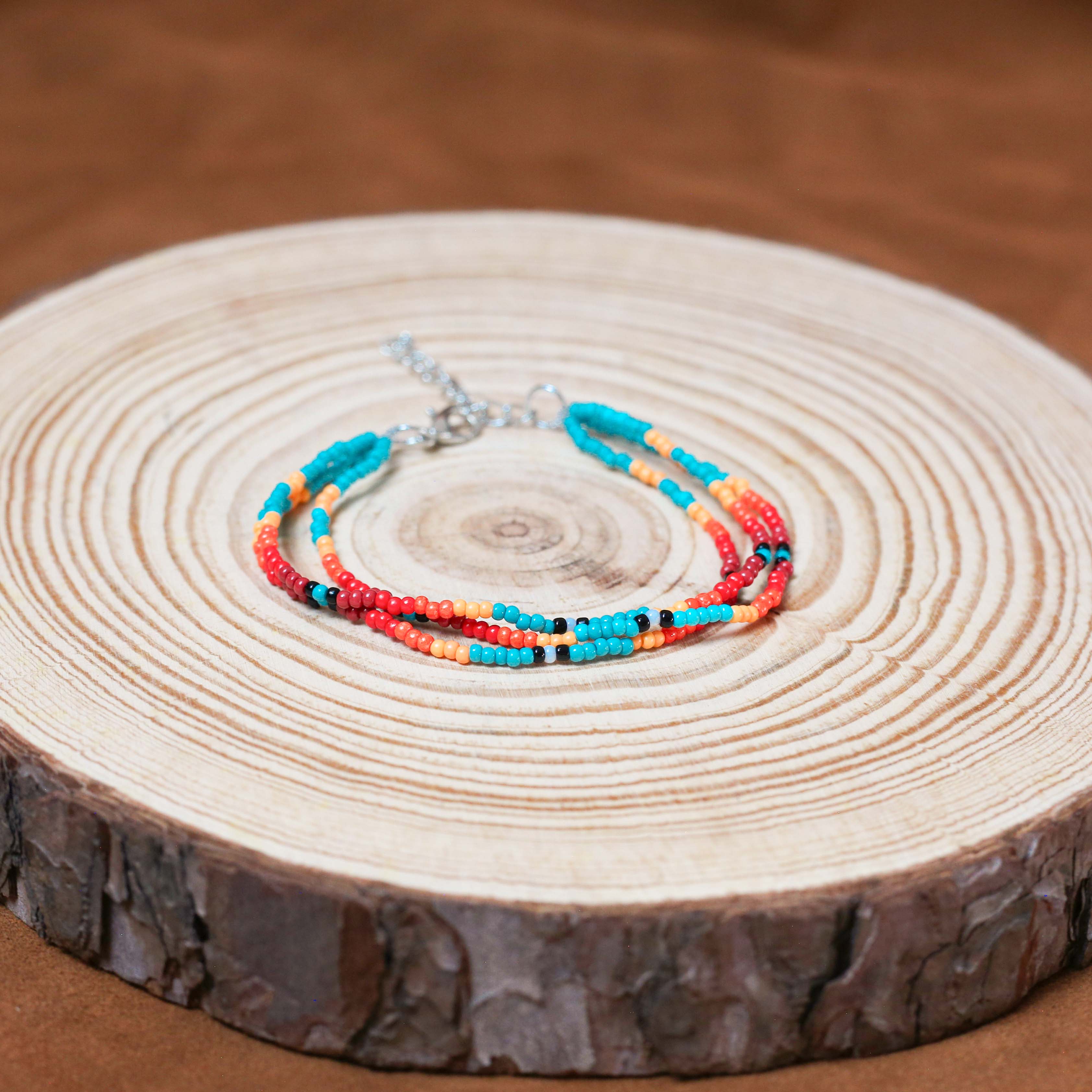 Sunset Glow Beaded Necklace And Bracelets Set – Multi-Strand with Red, Orange, and Turquoise Beads