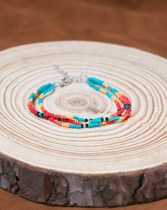 Sunset Glow Beaded Necklace And Bracelets Set – Multi-Strand with Red, Orange, and Turquoise Beads