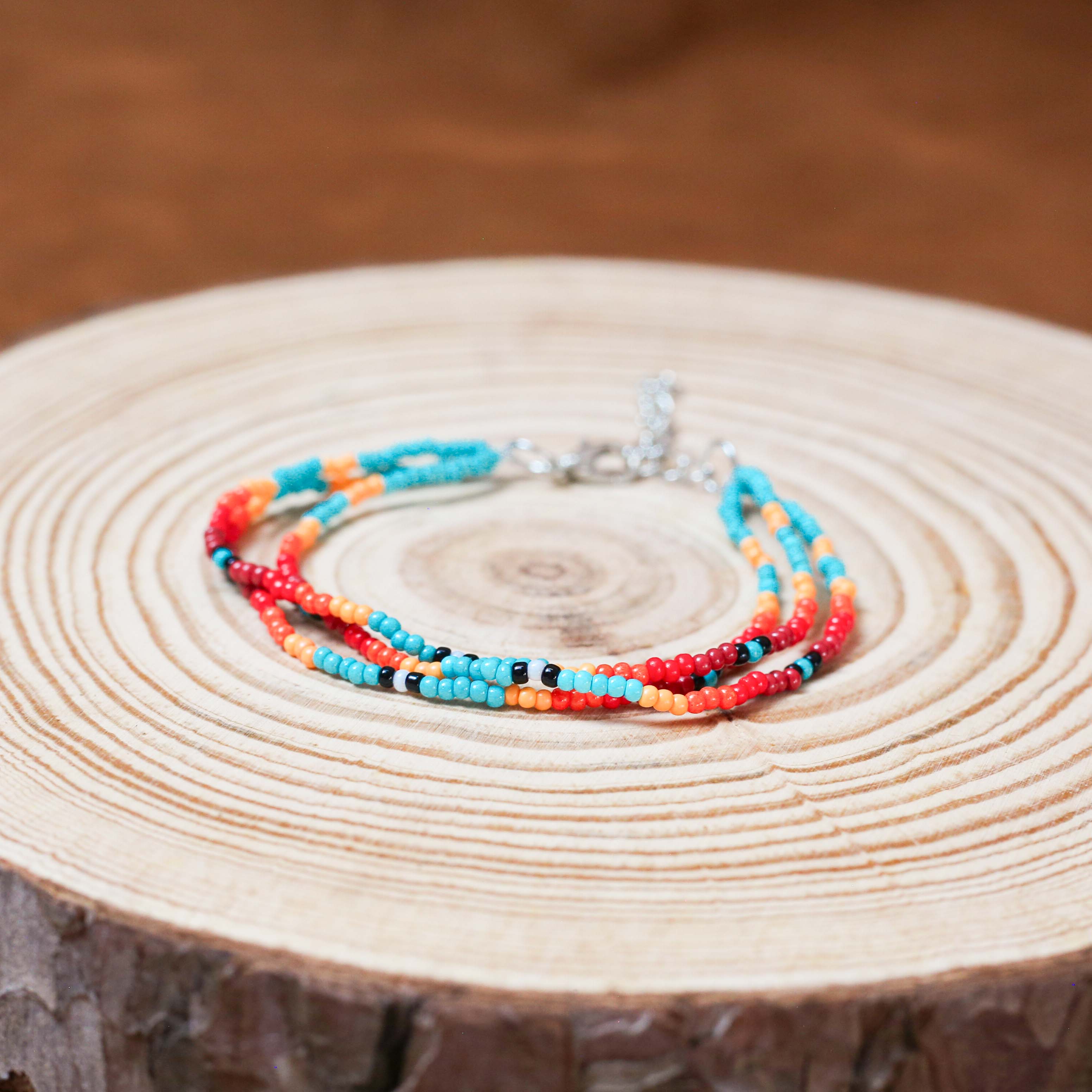 Sunset Glow Beaded Bracelet – Multi-Color Design with Red, Yellow, and Turquoise