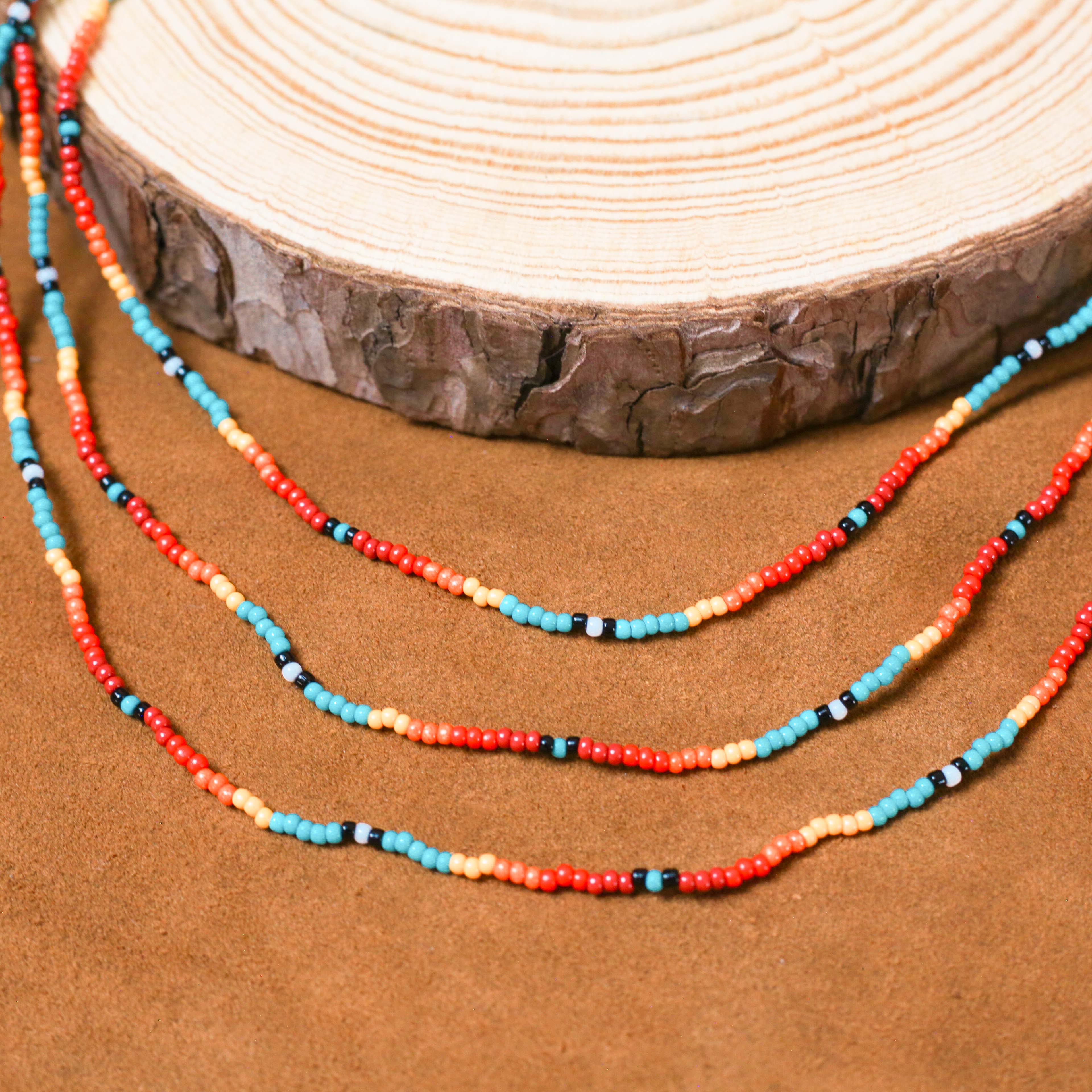 Sunset Glow Beaded Necklace – Multi-Strand with Red, Orange, and Turquoise Beads