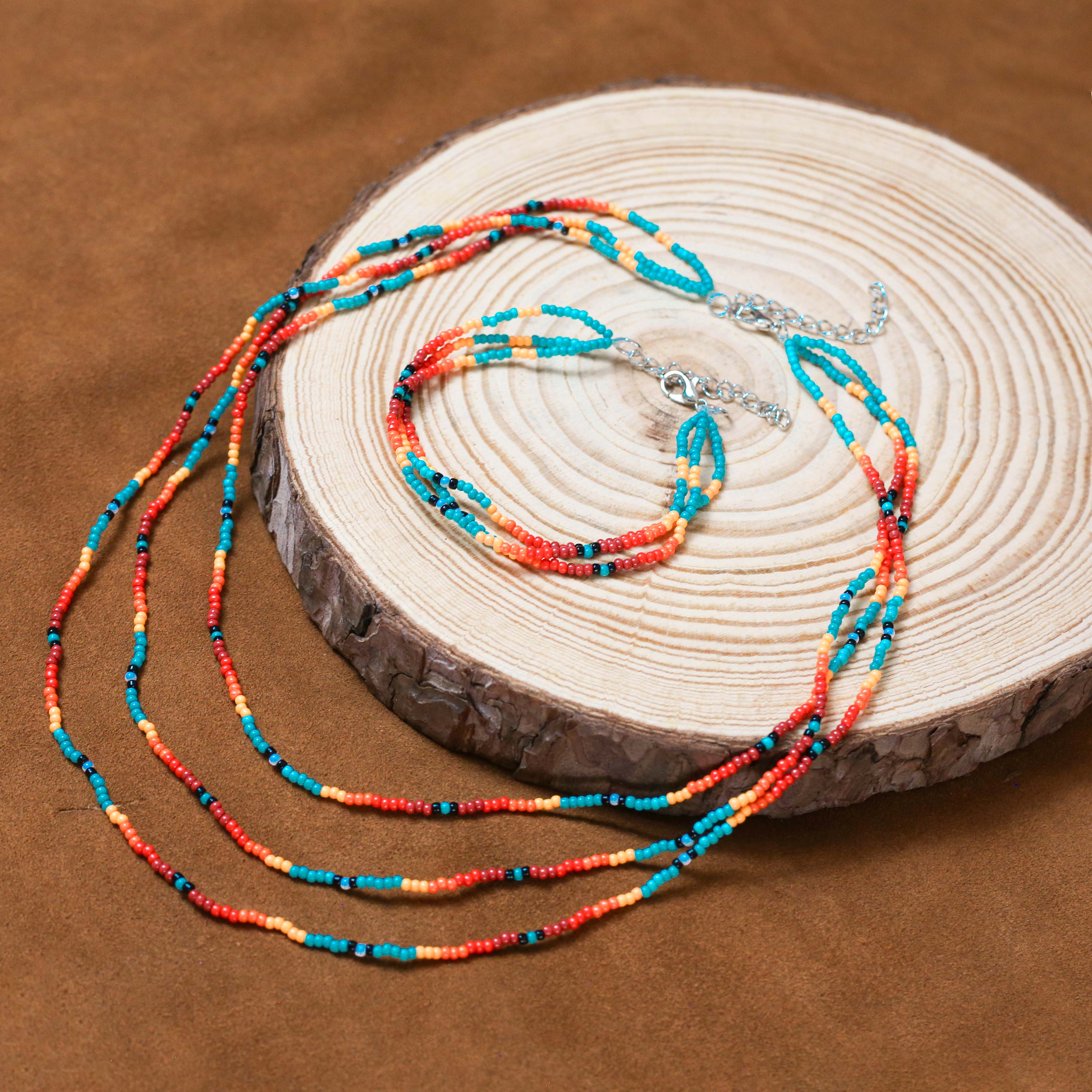 Sunset Glow Beaded Necklace – Multi-Strand with Red, Orange, and Turquoise Beads