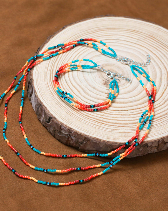 Sunset Glow Beaded Necklace And Bracelets Set – Multi-Strand with Red, Orange, and Turquoise Beads